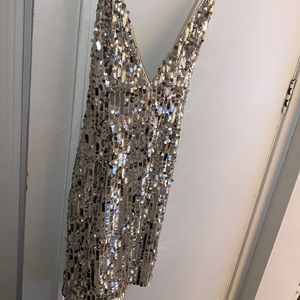 This dress was too small I got it for my bday never worn! But there is no tag on